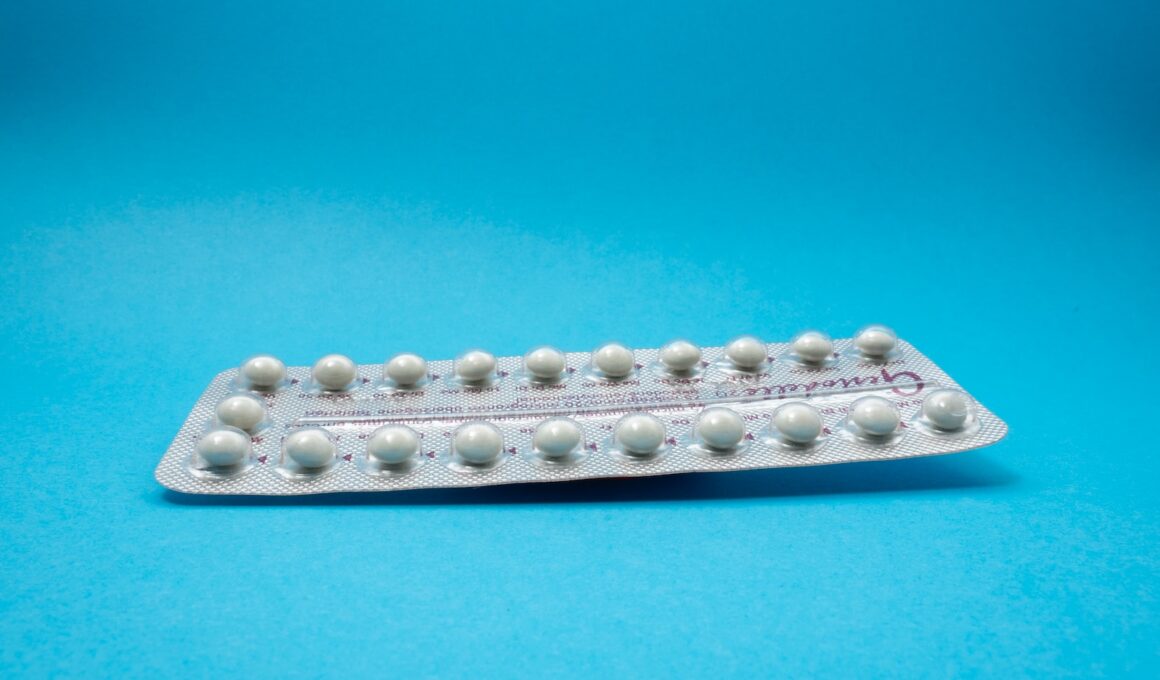 oral contraceptive pill on blue panel